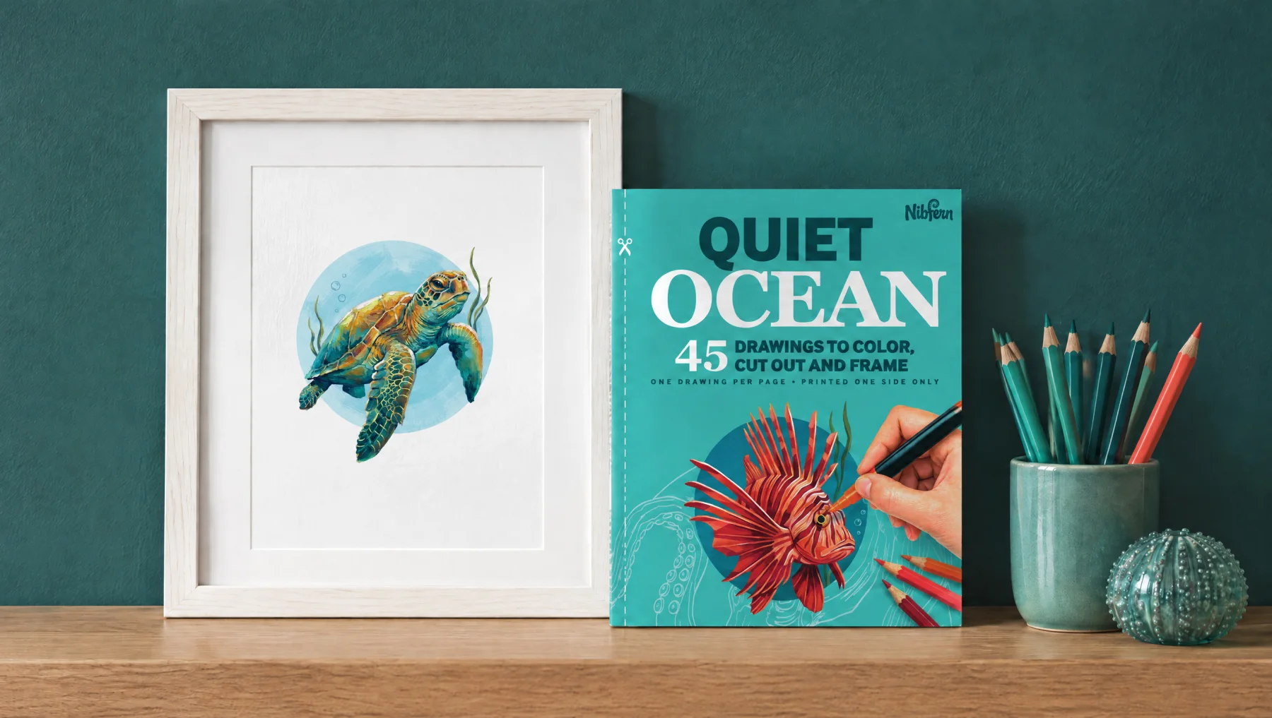 Quiet Ocean on a shelf beside a framed, colored sea turtle page and a cup of pencils